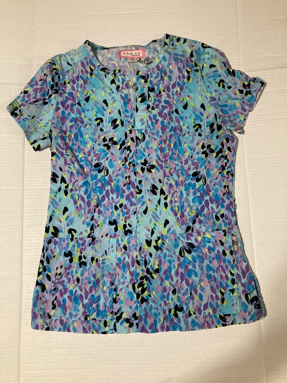 koi by Kathy Peterson Women's Floral-Leaf Print Scrub Top in Aqua and Purple